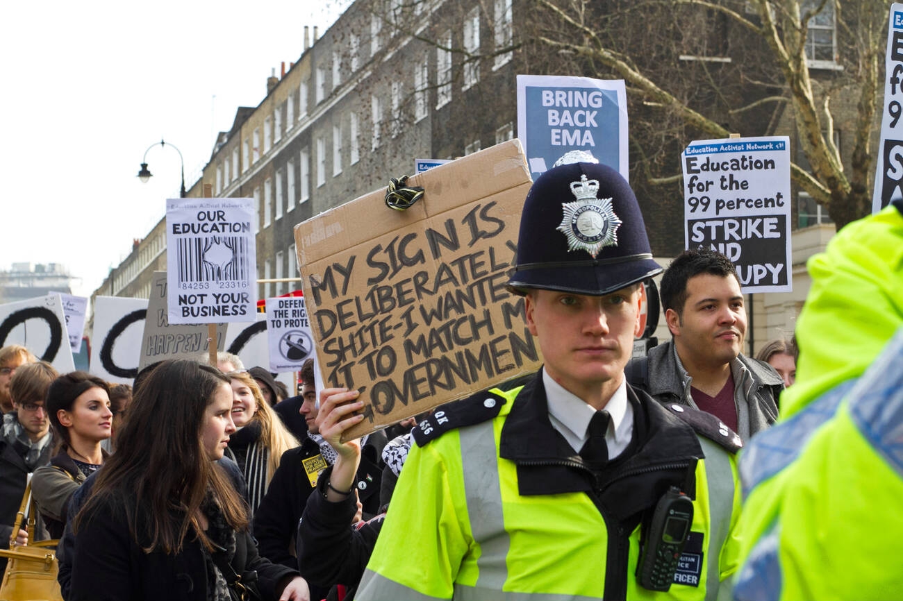 London, UK. 14/03/12.Students protest through London with banners and placards.