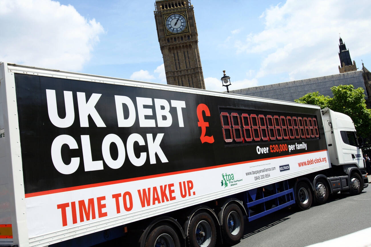 The Tax Payers' Alliance drives a lorry through Westminster to highlight the UK's national debt. London.